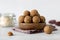 Healthy Granola Energy Balls with Nuts, Dates, Raisins. Raw dessert.
