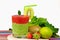 Healthy green and red smoothie with strawberry,kiwi,apples,spin