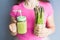 Healthy green smoothie with asparagus in woman`s hand. Vegan, raw food, detox and diet lifestyle.