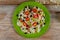 Healthy green vegetarian lunch with rice, tomato, avocado on table. Trend cuisine. Top view. Flat lay