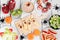 Healthy Halloween fruit treats, top view table scene over a white wood background