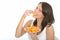 Healthy Happy Natural Young Woman Eating a Plate of Fresh Ripe Orange Segments