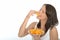 Healthy Happy Natural Young Woman Eating a Plate of Fresh Ripe Orange Segments