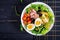 Healthy hearty salad of tuna, green beans, tomatoes, eggs, potatoes, black olives