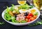 Healthy hearty salad of tuna, green beans, tomatoes, eggs, potatoes, black olives