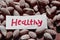 healthy highly protein almond nuts close up view,healthy nuts on wooden table,beautiful view of red healthy white pepper,black and