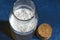 Healthy home-made fermented raw tea tea with natural probiotic properties. Kombucha in a glass bowl on a blue background