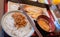 Healthy Japanese breakfast with Miso soup, grilled fish, rice and fermented soy beans called Natto