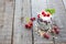 Healthy layered dessert with yogurt, black currant and raspberries