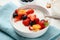 Healthy lifestyle banana smothie bowl with berry