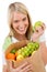 Healthy lifestyle - cheerful woman with fruit