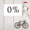 Healthy lifestyle concept, sport and diet - bicycle model, bottle of water, centimeter tape and text 0% percent