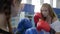 Healthy lifestyle, girl boxers training in gloved on boxing ring in gym
