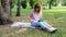 Healthy lifestyle girl eating salad smiling happy outdoors on beautiful day. Smiling Teenage Girl with Bowl of Salad