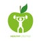 Healthy lifestyle person with dumbbell and green apple
