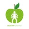 Healthy lifestyle person with dumbbell and green apple