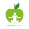 Healthy lifestyle person in yoga pose and green apple