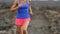 Healthy lifestyle runner woman trail running cross country running outdoors on volcano. Female athlete jogging training