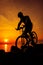 Healthy lifestyle. Silhouette of bicyclist riding the bike at se