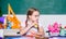 Healthy lifestyle. Snack between lessons. School life concept. Modern childhood. School break. Schoolgirl sit desk