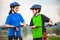 Healthy lifestyle - teenage girl and boy riding bicycles