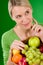 Healthy lifestyle - thoughtful woman with fruit