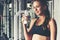 Healthy lifestyle woman drink protein at fitness gym.  Young people girl workout exercise body