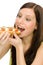 Healthy lifestyle - woman eat caprese sandwich