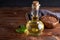 Healthy Linseed oil in glass bottle. Dark wooden background Copy space