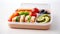 Healthy lunch box with fruits and vegetables isolated