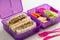 Healthy lunch box with sandwich, fresh vegetables and fruits