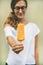 Healthy mango citrus ice cream popsicle in hand of woman