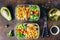 Healthy meal prep containers chicken and fresh vegetables