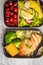 Healthy meal prep containers with grilled chicken with fruits, b