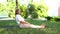 Healthy middle aged woman doing fitness stretching outdoors