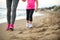 Healthy mother and baby girl walking on beach