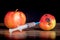 Healthy and mutilated apple. Introduction dose of drugs. Drug addiction. Injection during illness. Healthy and sick person_