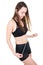 Healthy nutrition and weight losing concept young fit woman with slim body measuring her waistline and torso