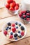 Healthy and nutritious yogurt with cereal and fresh raw berries