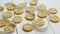 Healthy oatmeal cookies on white wood background, side view.