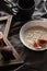 Healthy oatmeal with figs on a dark background. Gluten free, lactose free,