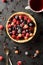 Healthy open pie with raw raspberries, blackberries and currants with tea