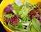 Healthy organic Spring Mix lettuce leaves after rinsing in colander