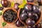 Healthy organically grown plums with dried plum fruits