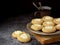 Healthy Peanut Butter Cheesecake Thumbprint Cookies. Delicious homemade shortbread and cup of tea on dark background. Copy space.