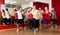Healthy people dancing in gym