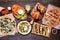 Healthy plant based fast food table scene. Top down view on a wood background.