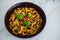 healthy plant-based food, shell pasta with dairy-free mushroom sauce capsicum and basil