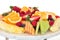 Healthy platter of different sliced fruits