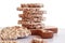 Healthy quick snack: a stack of oatmeal cookies on a wooden kitchen board, close-up, light background